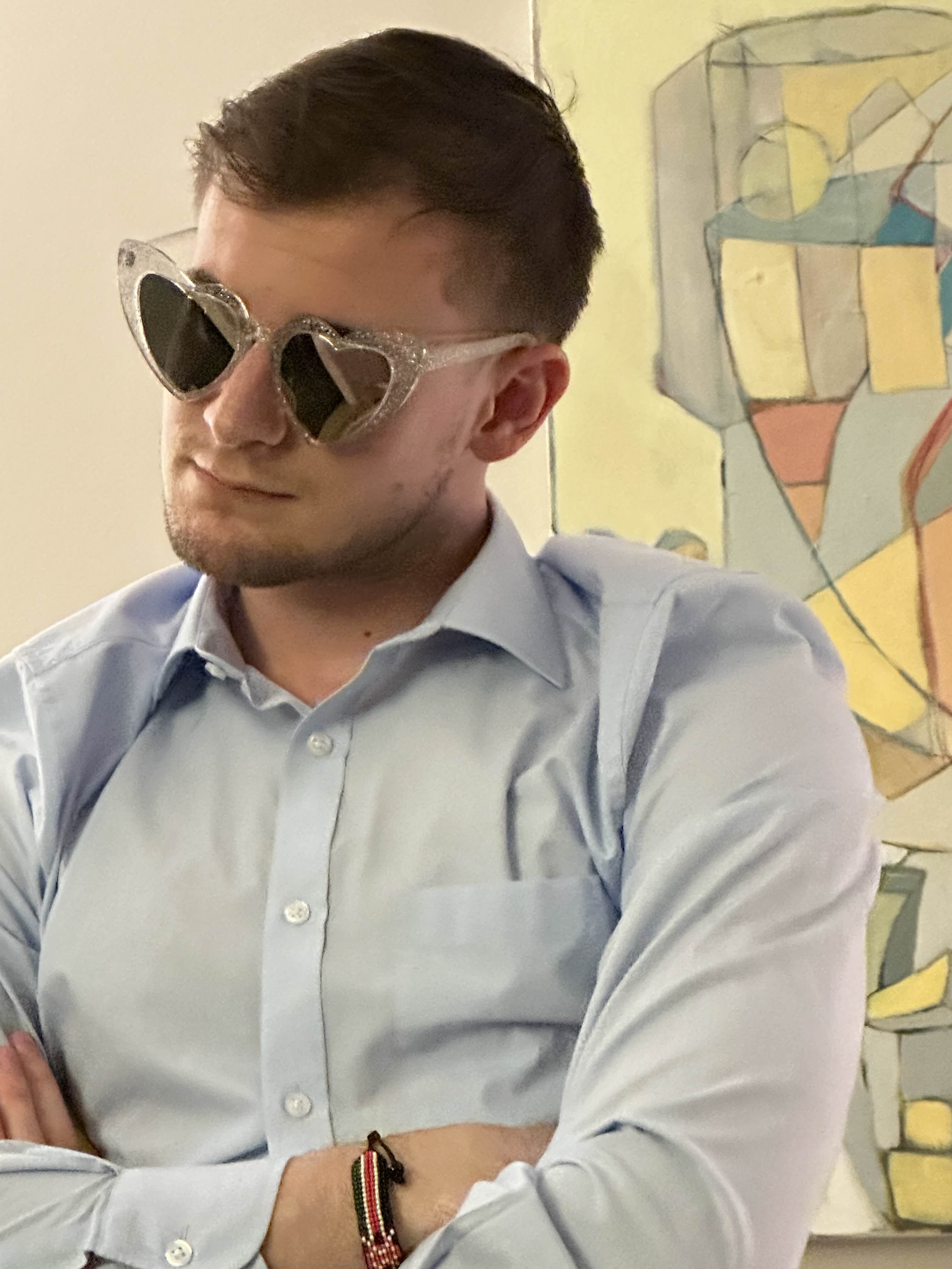 Aenea Vannoni wearing sunglasses and a light blue shirt